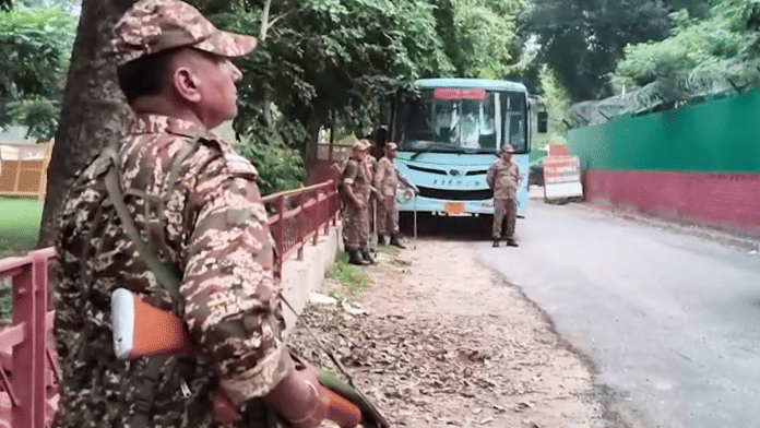 Security personnel stand guard during a CBI raid at Punjab Chief Minister Bhagwant Mann's camp office in Chandigarh on Tuesday | PTI