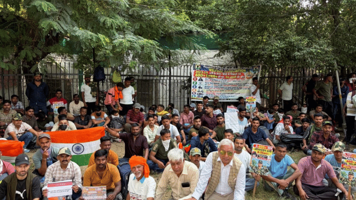 The dismissed tradesmen during a protest outside BSF headquarters at the CGO Complex on Friday | Special Arrangement