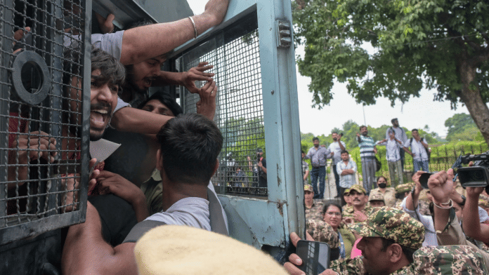 Young protesters detained by Delhi Police during their agitation Saturday to press for resignation of CEC Gyanesh Kumar. | Suraj Singh Bisht/ThePrint