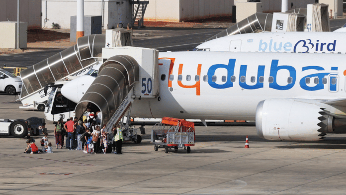 Representational image. | Travelers board a flydubai aircraft at Ben Gurion International Airport.| Reuters