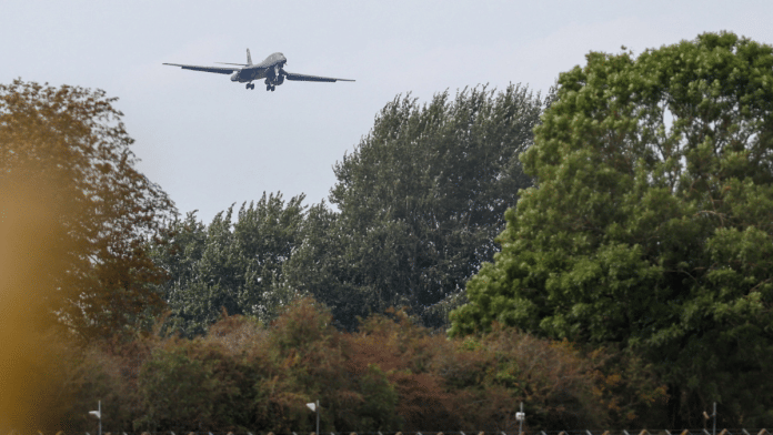 A B‑1 bomber arrives at RAF Fairford airbase after police declared a major incident at the base and arrested several men on suspicion of offences under the Explosives Act last week. | Reuters