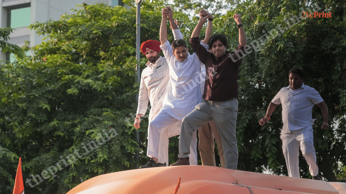 Congress leaders Congress MPs Amarinder Singh Raja Warring, Deepender Singh Hooda, Imran Pratapgarhi seen atop a bus as Oppn leaders protest, demanding Chief Election Commissioner Gyanesh Kumar's resignation | Suraj Singh Bisht | ThePrint