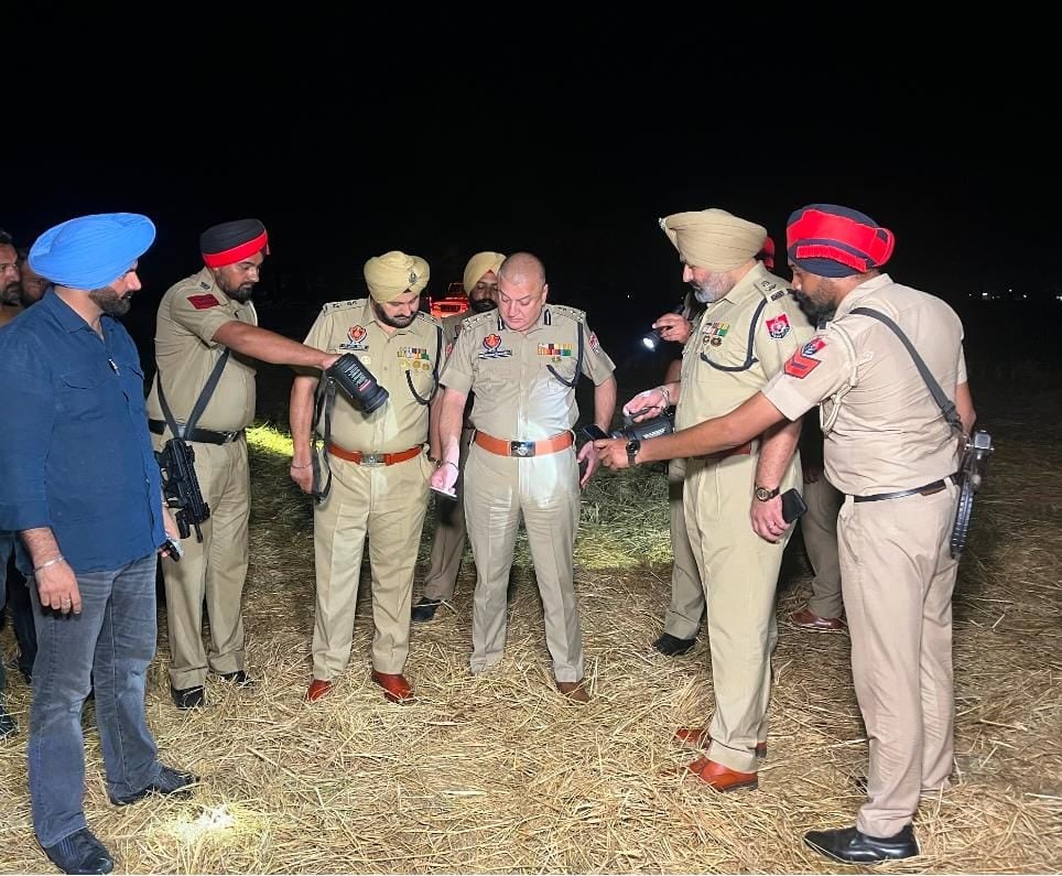 Amritsar Police Commissioner Harmanbir Singh Gill (centre) with other police officers at the site where Deepak Singh was shot dead | By special arrangement