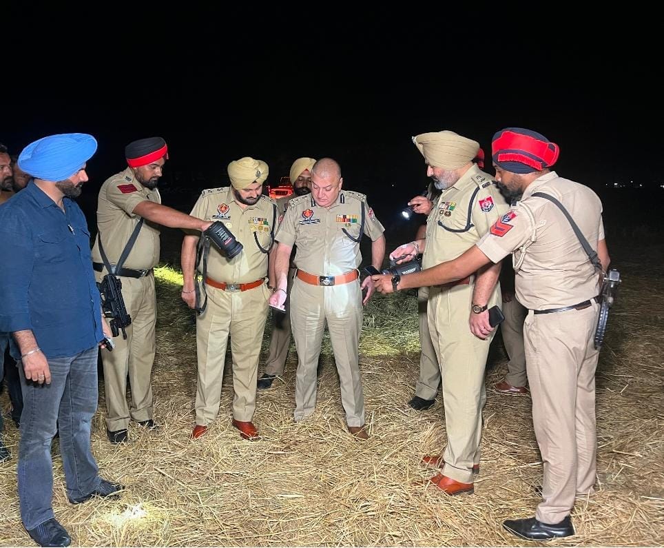Amritsar Police Commissioner Harmanbir Singh Gill (centre) with other police officers at the site where Deepak Singh was shot dead | By special arrangement