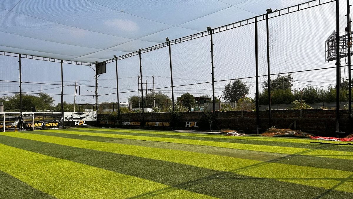 An indoor-lit box cricket turf at Fluxon Sports in Sector 58, Gurugram, where Kumar manages bookings and coaches players | Photo: Manisha Mondal | ThePrint