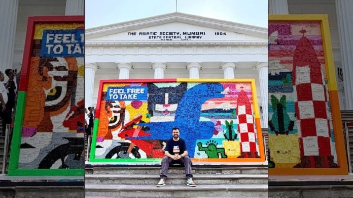 Guinness World Record holder and Lego artist Ritam Bhatnagar in front of the LEGO mural at the Asiatic Society in Horniman Circle, Mumbai | Tarini Unnikrishnan, ThePrint