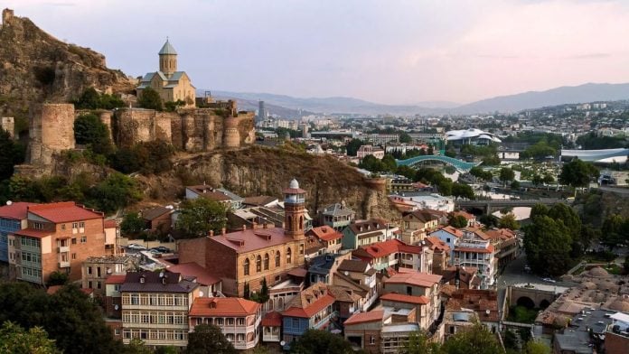 A view of Tbilisi, Georgia, with the historic Old Town in the foreground and the modern city stretching into the distance | Photo by special arrangement